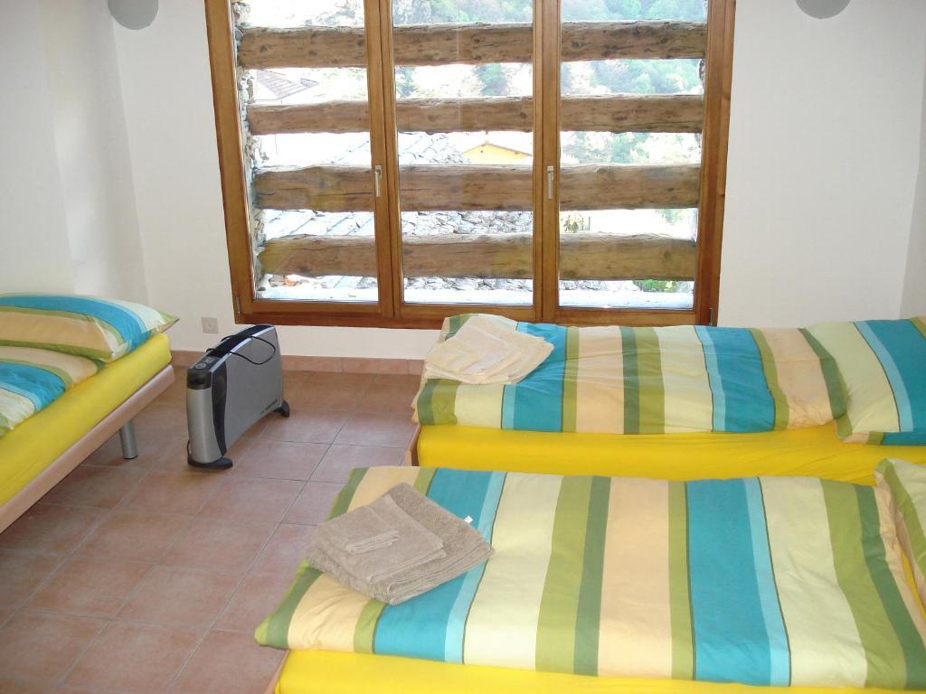 Apartamento Rustico Pacifico Brontallo Habitación foto